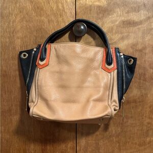 orYANY Tan and Black Mini Bag with Orange Accents